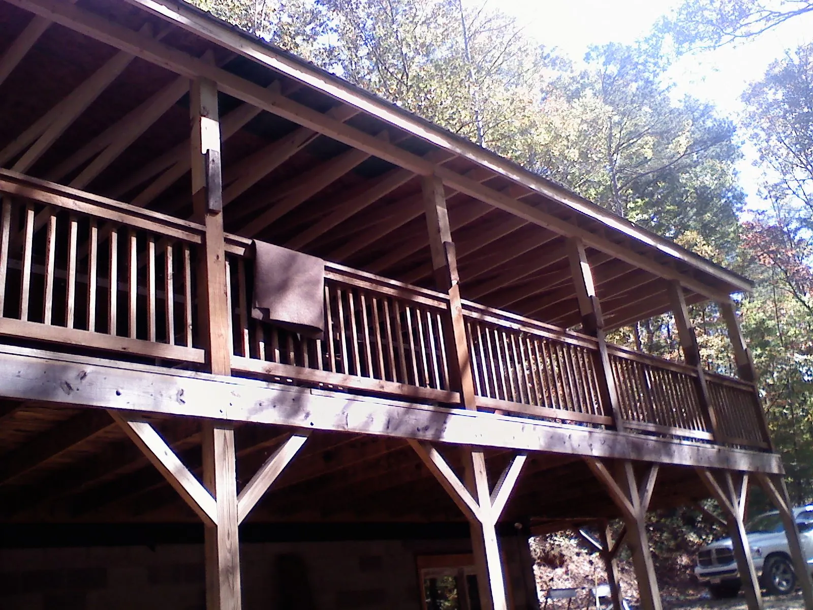 Timber framing under a new elevated porch and deck — Roof Leak Repair in La Vernia by Roofing Brothers